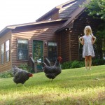 Beth with the chickens in our backyard